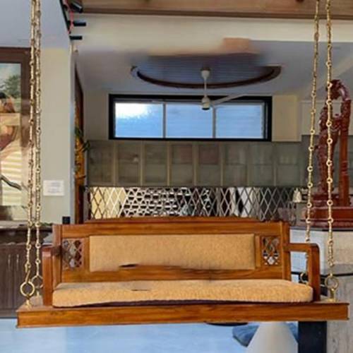 Brown Wooden Swing 3 Seater Antique Appearance with Hand Carving Made in India Manufacturers, Suppliers, Exporters in Navi Mumbai